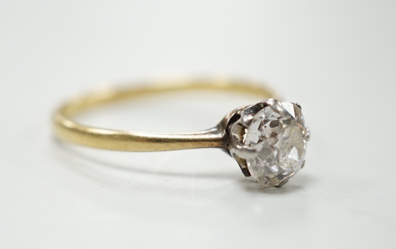 An 18ct, plat and solitaire diamond ring, size M/N, gross weight 1.8 grams, the stone measuring approx. 6.0mm by 5.2mm.